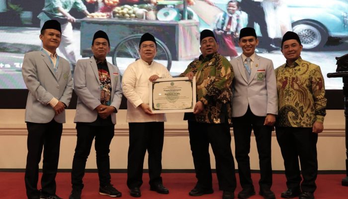 Rapimnas BKPRMI 2026 : Wesly Silalahi Terima Piagam Penghargaan